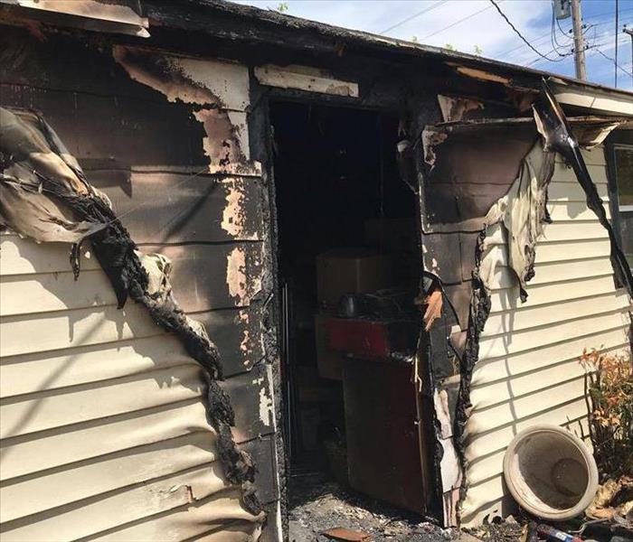 fire burned exterior of home
