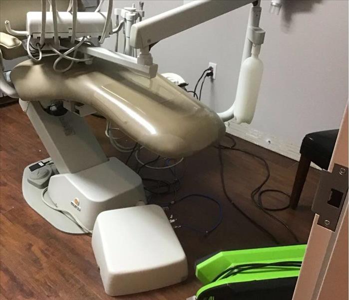 dental chair, wet floor