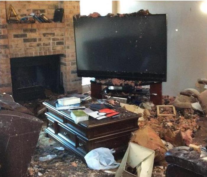 living room, big tv, fire damage